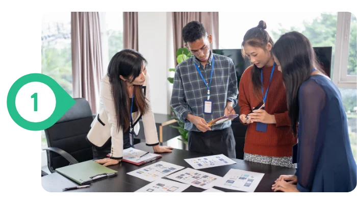 showing team discussing a new WordPress web design project